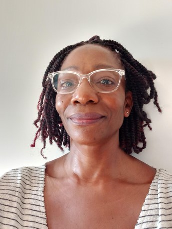A headshot of Pontso Mafethe. She is a Black woman with chin-length braids and glasses with clear plastic frames. She is smiling slightly at the camera.